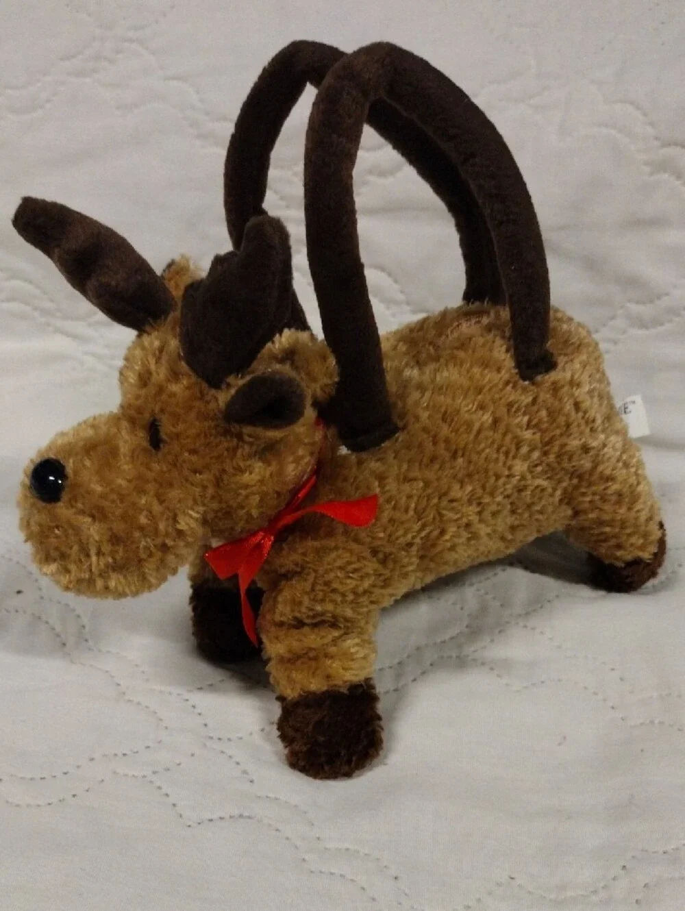 Galerie Reindeer Purse With A Red Ribbon